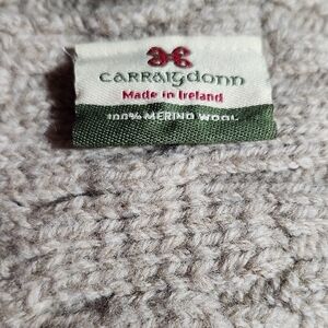 Made In Ireand 100 % Merino wool. See Last Picture to See A Slight Hole.